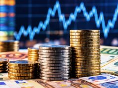 Almanya ekonomisi için 2026 ve 2027 büyüme tahminleri yükseltildi Madeni paralar ve finansal unsurları gösteren temsili görsel